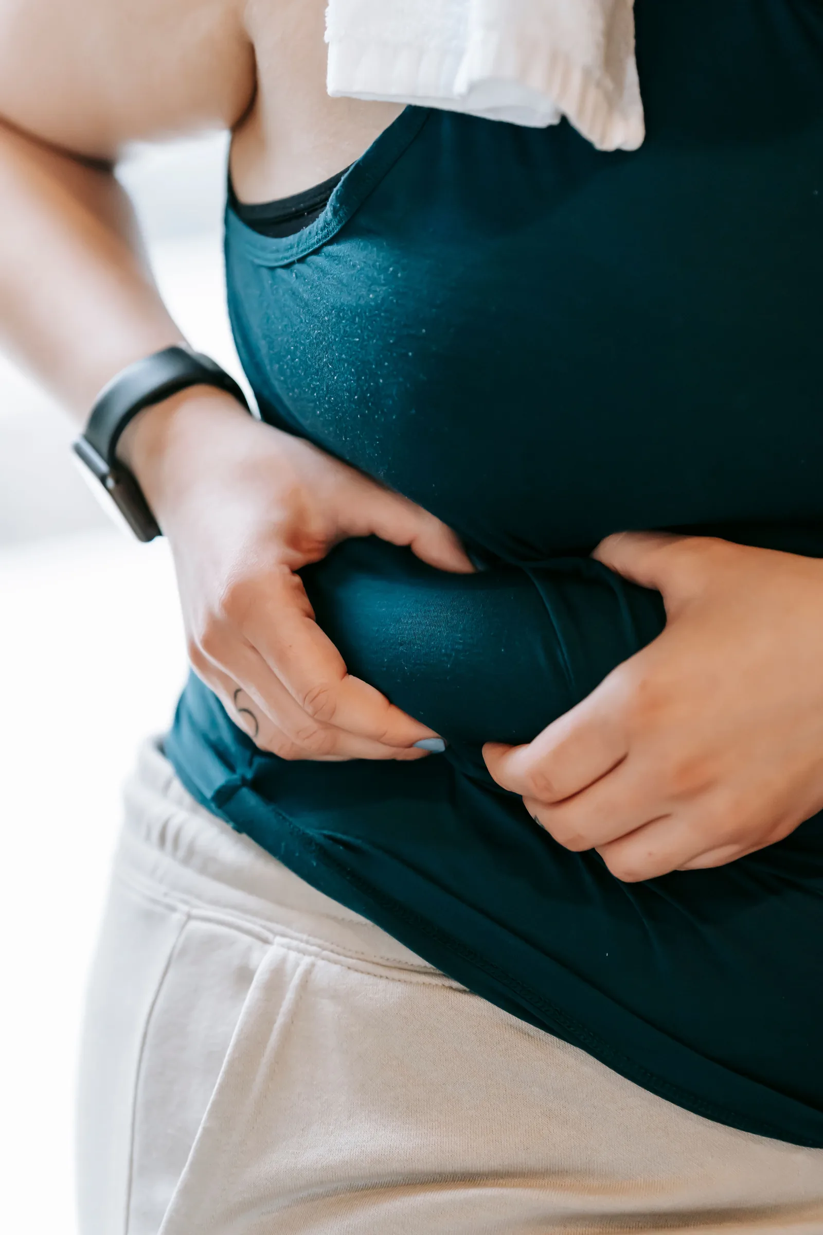 Holding the midsection after exercise